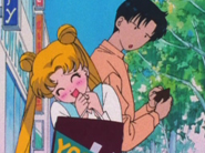 Mamoru checks out the non-existant money in his wallet